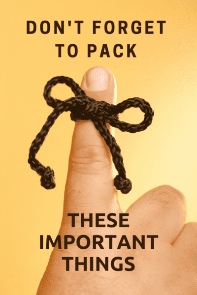 Finger with a't string wrapped around it. Text overlay says "don't forget to pack these important things"