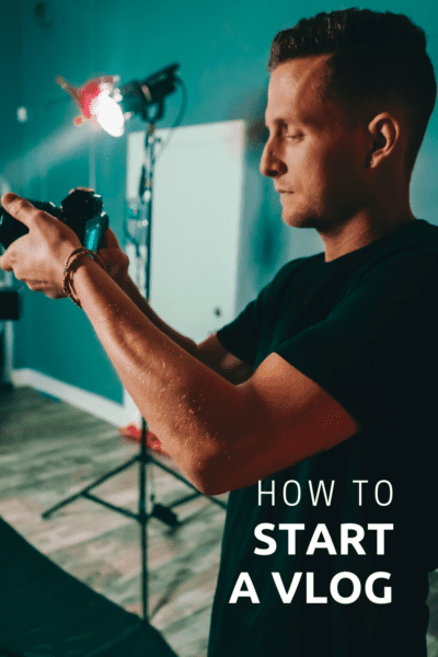 man using a camera. Light in background. Text overlay says "how to start a vlog"