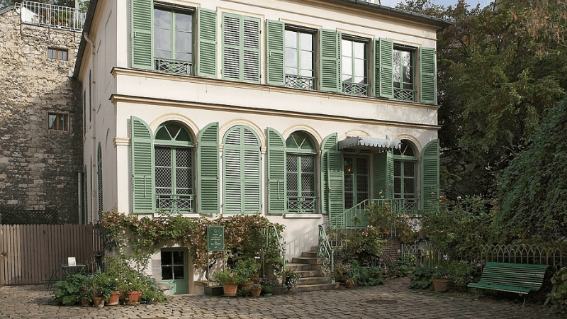 House with green shutters in Paris