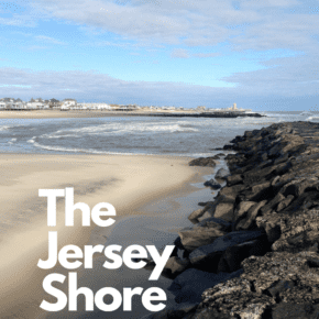 water and sand with rocky outcrop in foregroud Text overlay says "the jersey shore 10 best beaches"