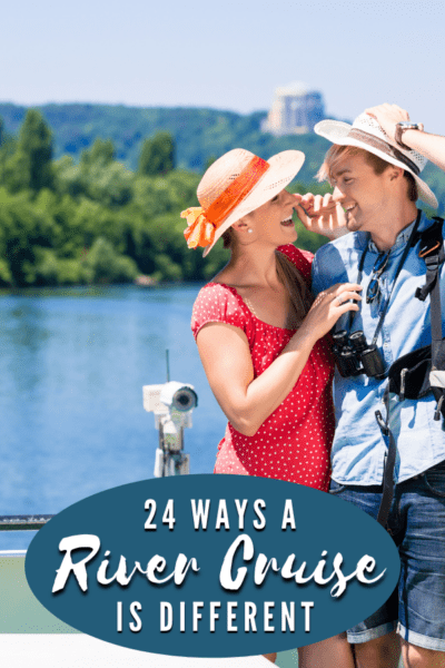 Couple on a river cruise ship. Shoreline in background. Text overlay says "24 ways a river cruise is different"