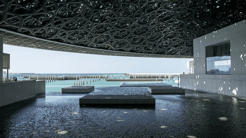 Louvre Abu Dhabi surrounded by water