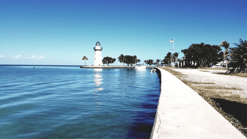 Paved walkway along the water at Biscayne Nat'l Park. Lighthouse in background