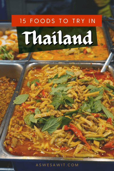 buffet of various thai foods. Text overlay says "15 foods to try in Thailand"