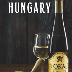 bottle and glsas of Tokaji wine. Text overlay says "Best souvenirs of Hungary"