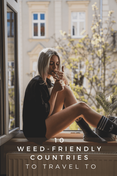 Young woman sitting in a window and smoking a joint. Text overlay says "10 weed-friendly countries to travel to"