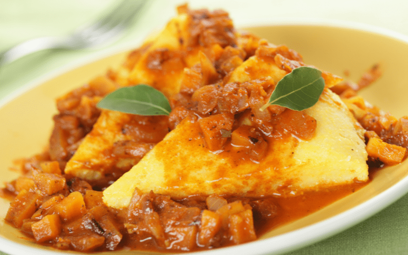polenta with venison, a typical dish in the Dolomites