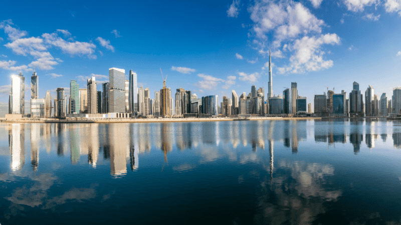 dubai skyline, water in foreground