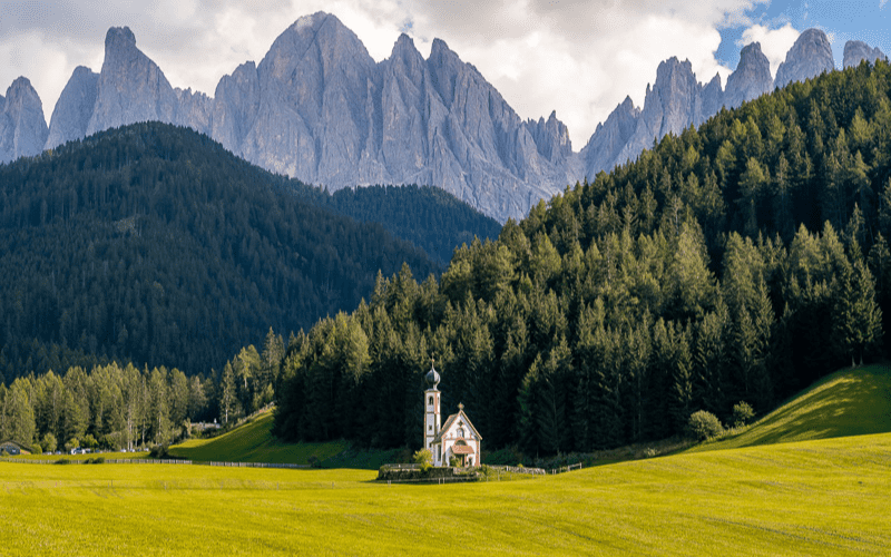 Church of St John in Ranui with mountains in the background