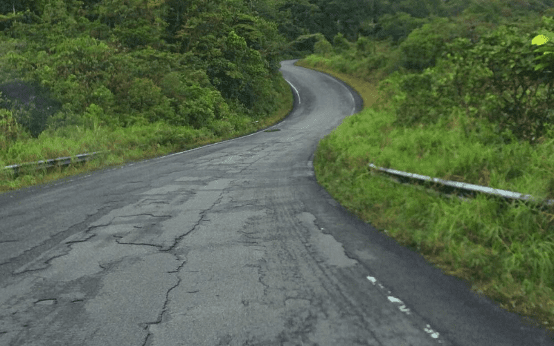 pothole and cracks in a road