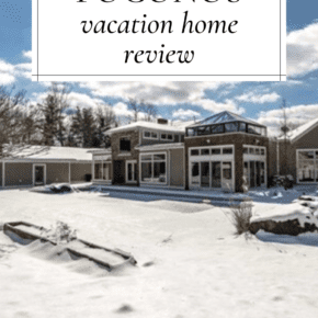 Exterior of the vacation home rental surrounded by snow. Text overlay says "Poconos Vacation Home Review"