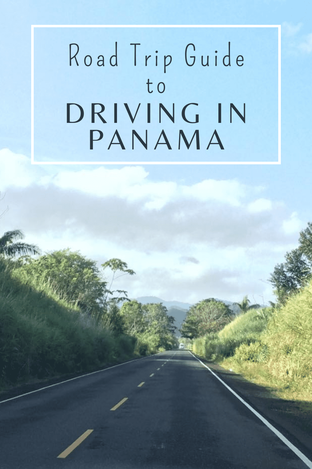 view down a panama road with mountains in the background. Text overlay says "road trip guide to driving in Panama"