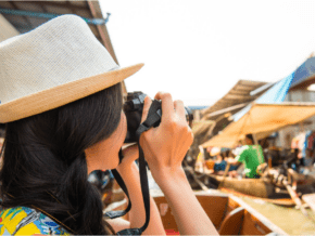 woman taking videos while travleing