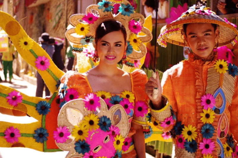 Couple dressed up for Pahiyas, one of the best festivals in the Philippines