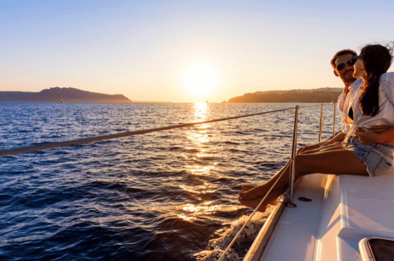 Couple on a romantic sunset cruise