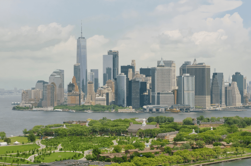 Governors Island NYC in the foreground, Manhattan skyline in the background.