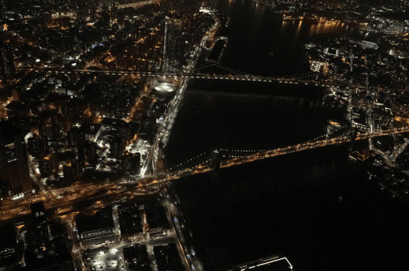 Helicopter view at night in New York City