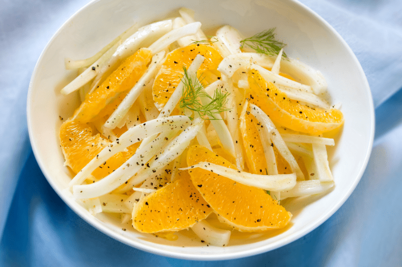 a plate of orange and fennel slices