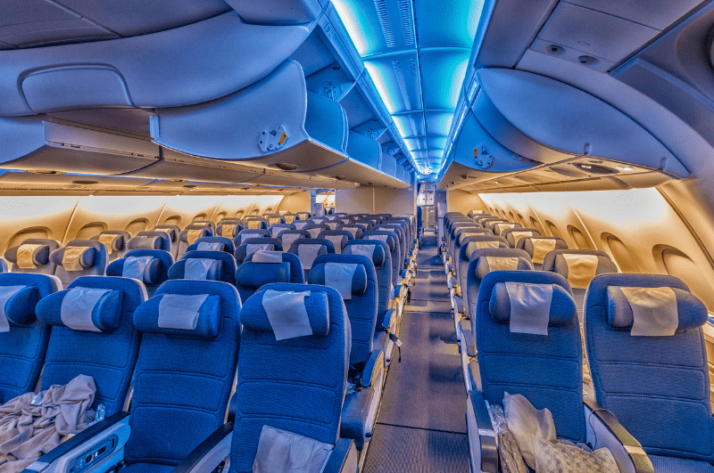 empty airplane cabin illuminated for nighttime