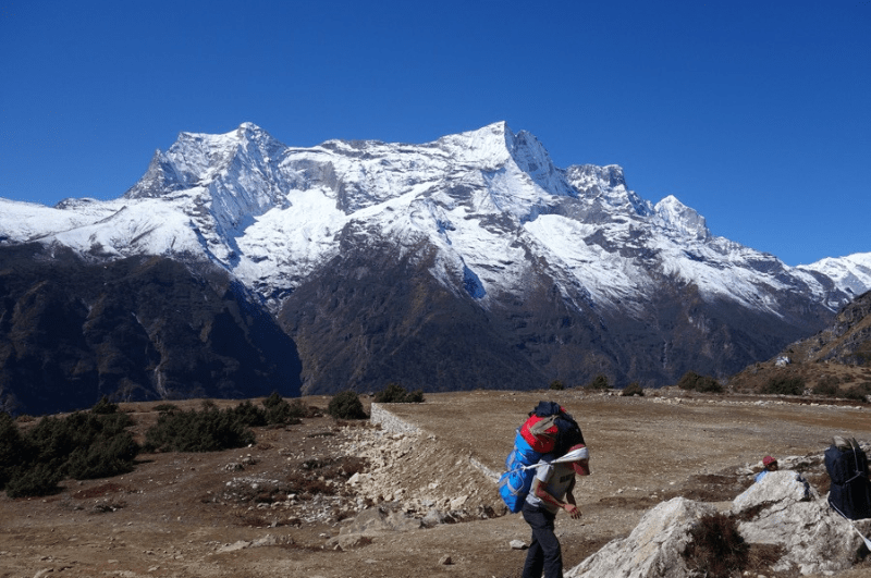 Sherpa on the Everest Base Camp trek. Cost is worth it.