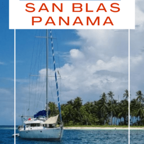 A sailboat in front of an island in San Blas. Text overlay says "how to visit San Blas Panama"
