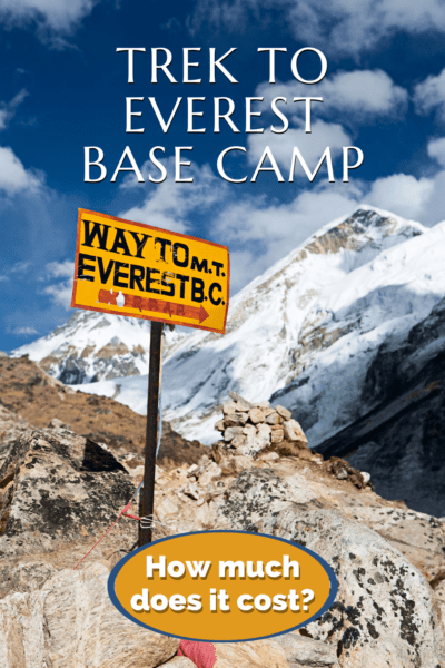 Sign pointing the way to Mt Everest Base Camp. Text overlay says "trek to Everest Base Camp How much does it cost?"