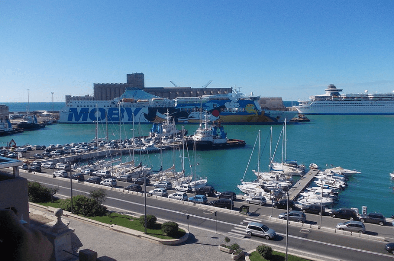 Cruise ship, ferry and boats docked at the port of Civitavecchia Italy