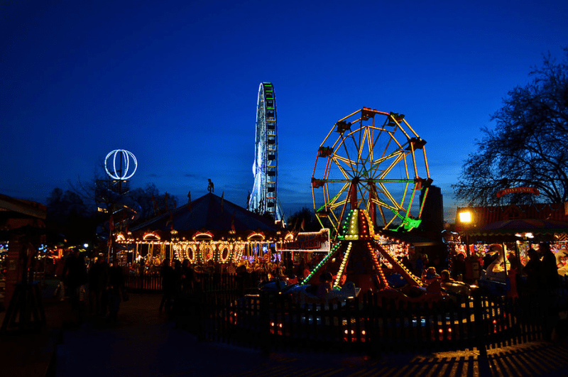 Ferris wheels and booths at the Hyde Park Christmas market in London