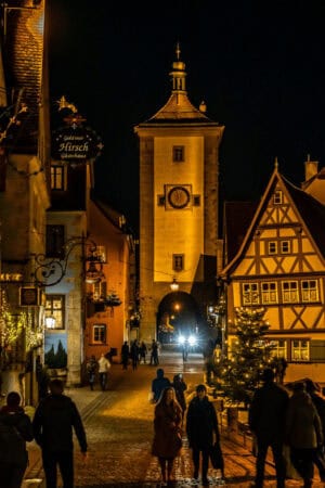 Medieval tower in Rotherburg Germany illuminated after dark