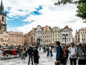 Tourists walking around Wenceslas Square, an essential stop on a Prague 3 day itinerary