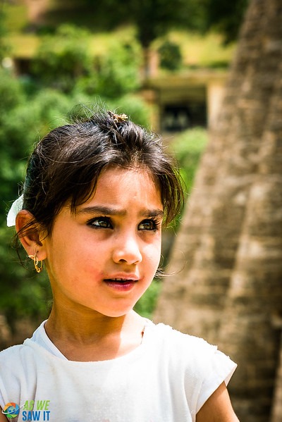 Yazidi girl with kohl-rimmed eyes in Lalish, Iraqi Kurdistan