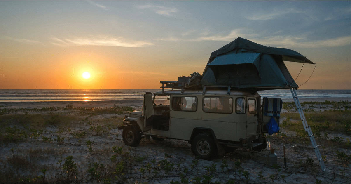 4-wheel-drive car set up for camping