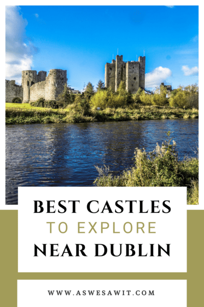 Trim Castle, reflected in the river. Text overlay says "best castles to explore near Dublin, www.aswesawit.com"