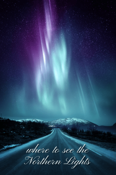 road leading to horizon, and northern lights