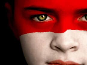 face painted with the Indonesian flag