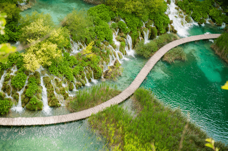A boardwalk passing by some of the waterfalls at Plitvice Lakes, Croatia