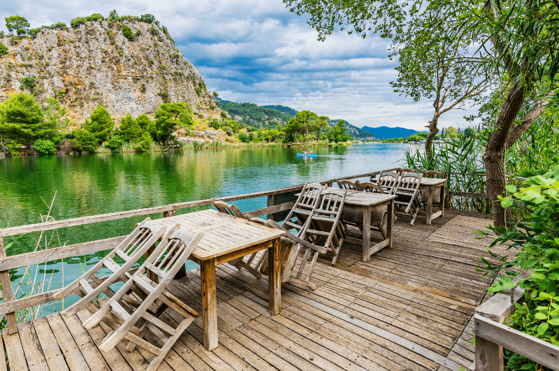 three tables at a dock along the Dalyan River in Turkiye