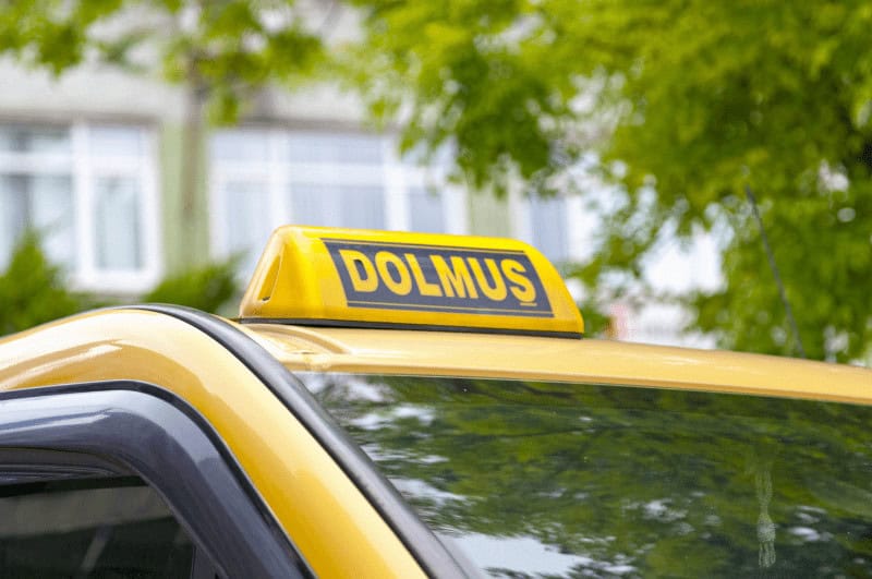 Dolmus sign on top of a car in turkey