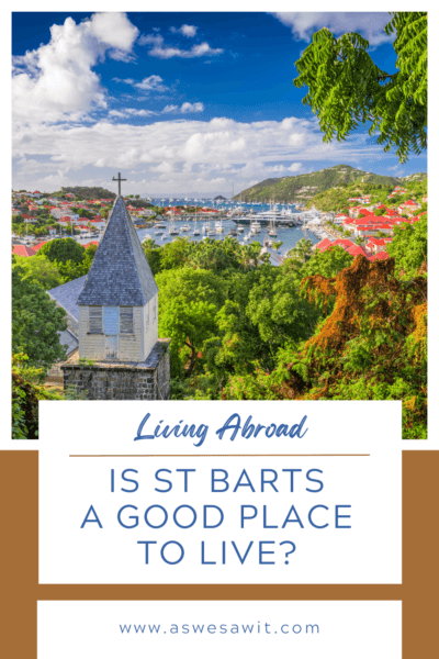 The town of gustavia, with church in foreground. The text overlay says "living abroad: is Saint Barts a good place to live"