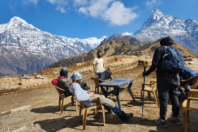 people relaxing during the trek to Mardi Himal