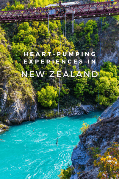 A bungee jumper over a river in New Zealand. The text overlay says "heart pumping experiences in New Zealand.”