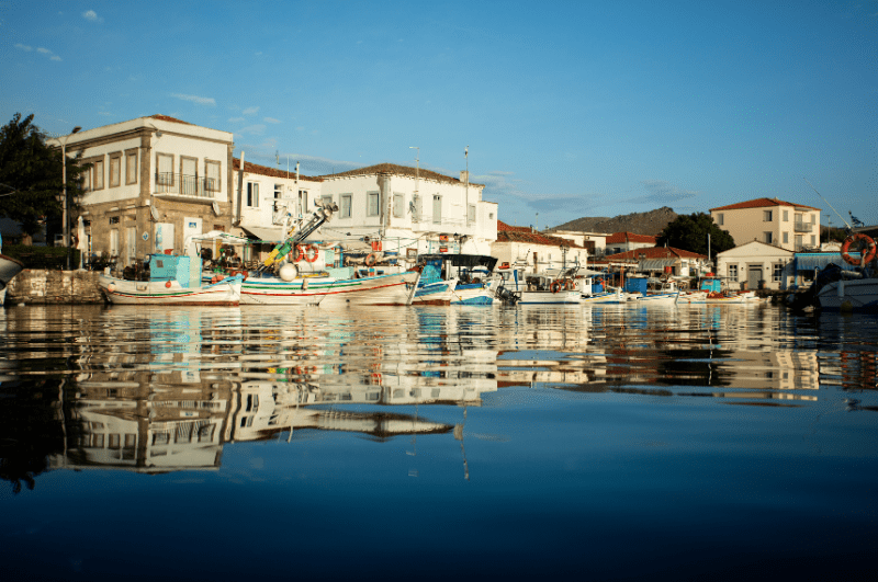 Lemnos Island in Greece with colorful fishing boats and nice reflection