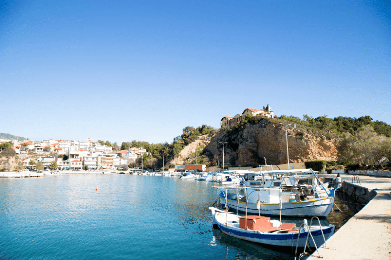 Greek island of Thassos with boats and city view in the winter