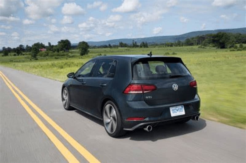Back end of a Volkswagen Golf GTI, on a road in Europe