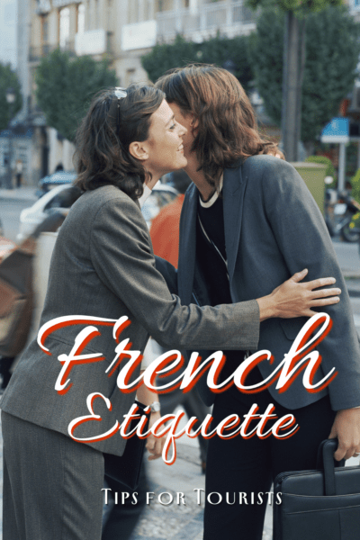 Two women embracing. The text overlay says "French Etiquette tips for tourists"