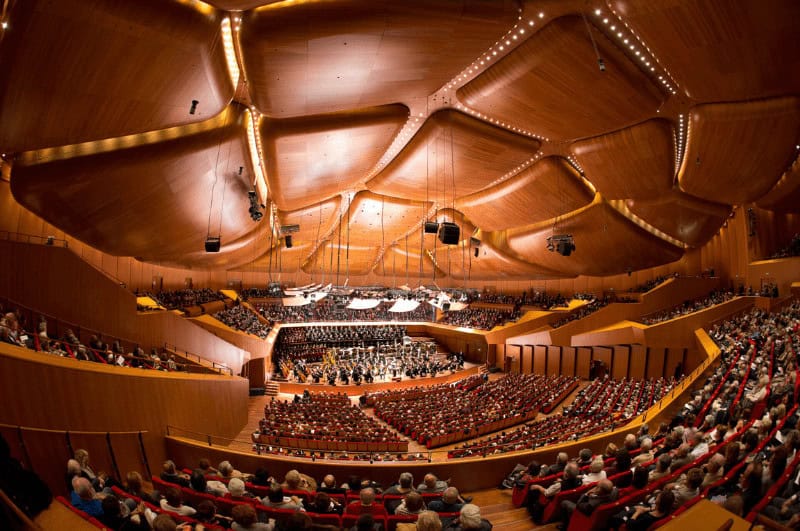 A full auditorium of people who have come to watch an opera concert in Rome.