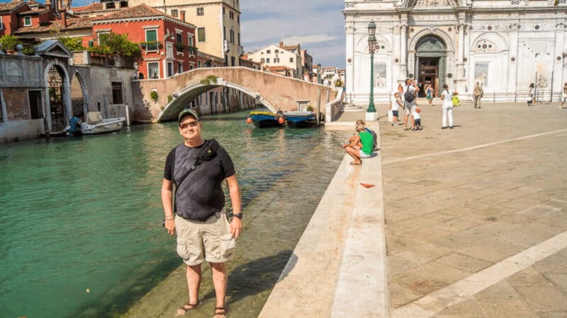 Man standing in the water in Veice
