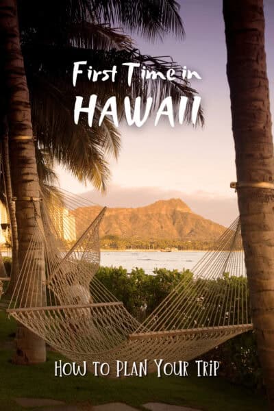 A hammock between palm trees. Volcano in background. Text overlay says "first time in Hawaii - How to plan your trip"