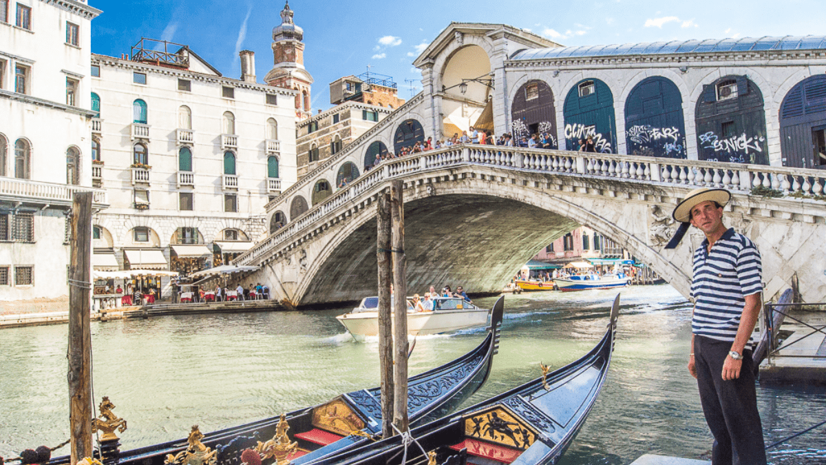A gondolier at Rialto Bridge in Venice Italy