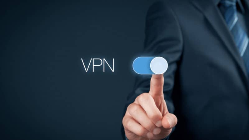 finger moving a virtual switch to the on position. The word VPN is next to it.